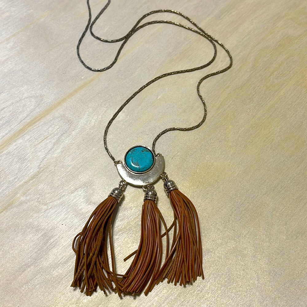 Long silver necklace with turquoise and leather tassels